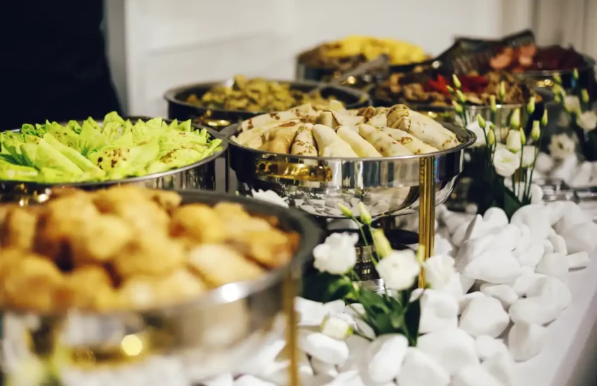 event planner booking professional catering services for smooth event experience